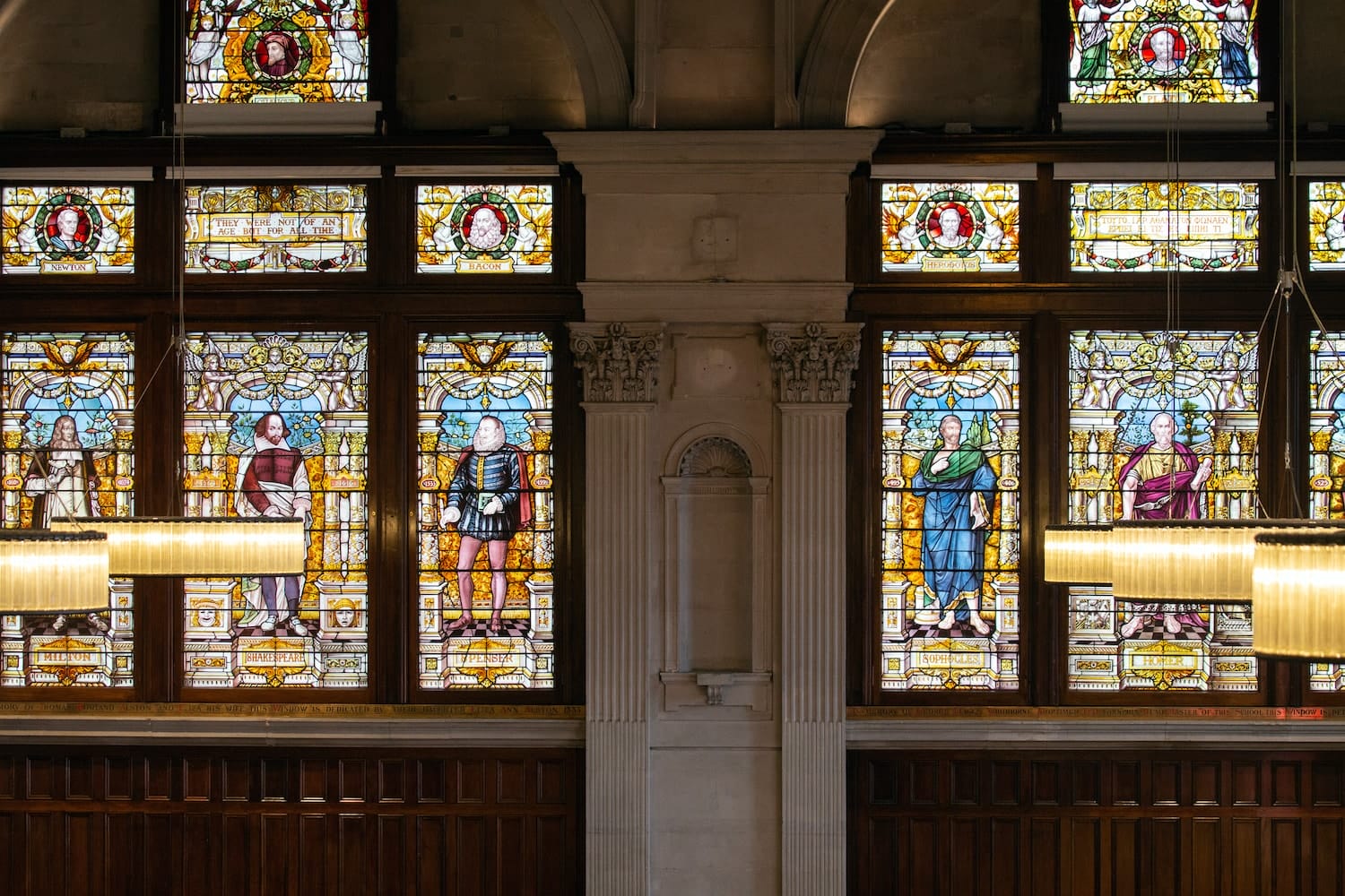 a couple of large stained glass windows in a building.